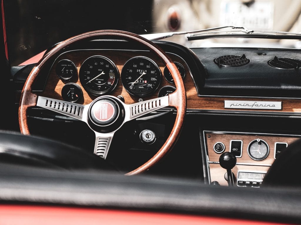 Wooden steering wheel in car
